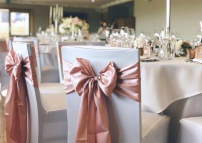 White Wedding Chair Covers and Blush Pink Taffeta Sashes