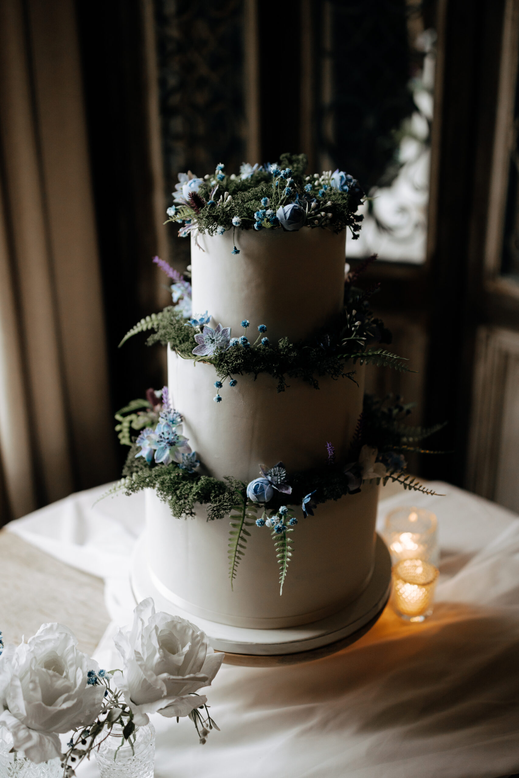Ambience Derbyshire Whimsical Wedding Cake Moss Blue