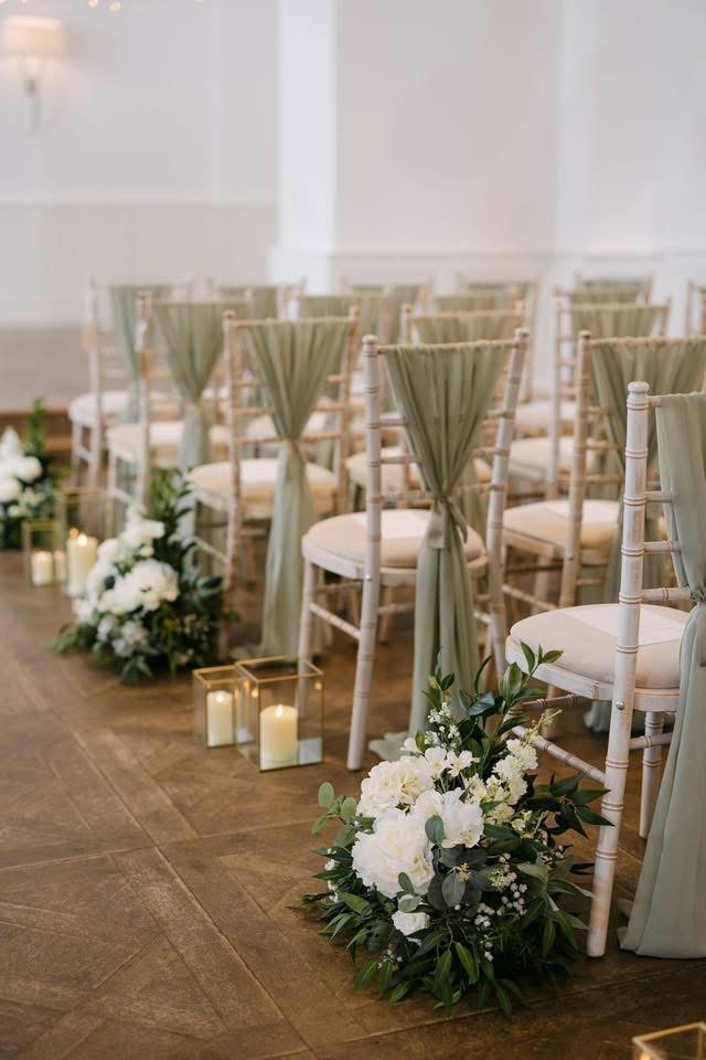 Ambience-Venue-Styling-South-Downs-Hampshire-Aisle-Decor-Faux-Flowers-Chair-Decor