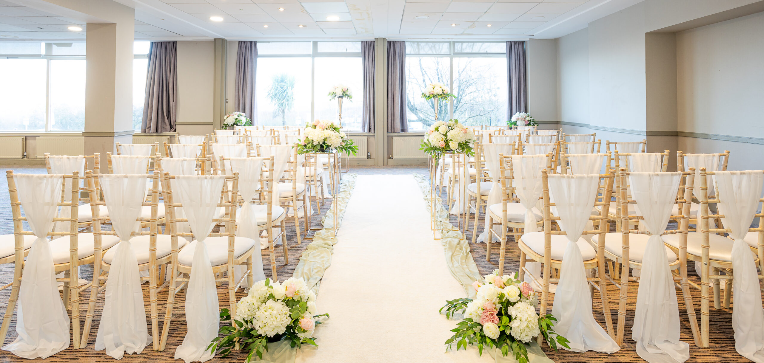 Ambience-Venue-Styling-Huddersfield-Oldham-Manchester-Wedding-Styling-Chair-Decor-Ceremony-Chiffon-Drapes-Floral-Arrangements