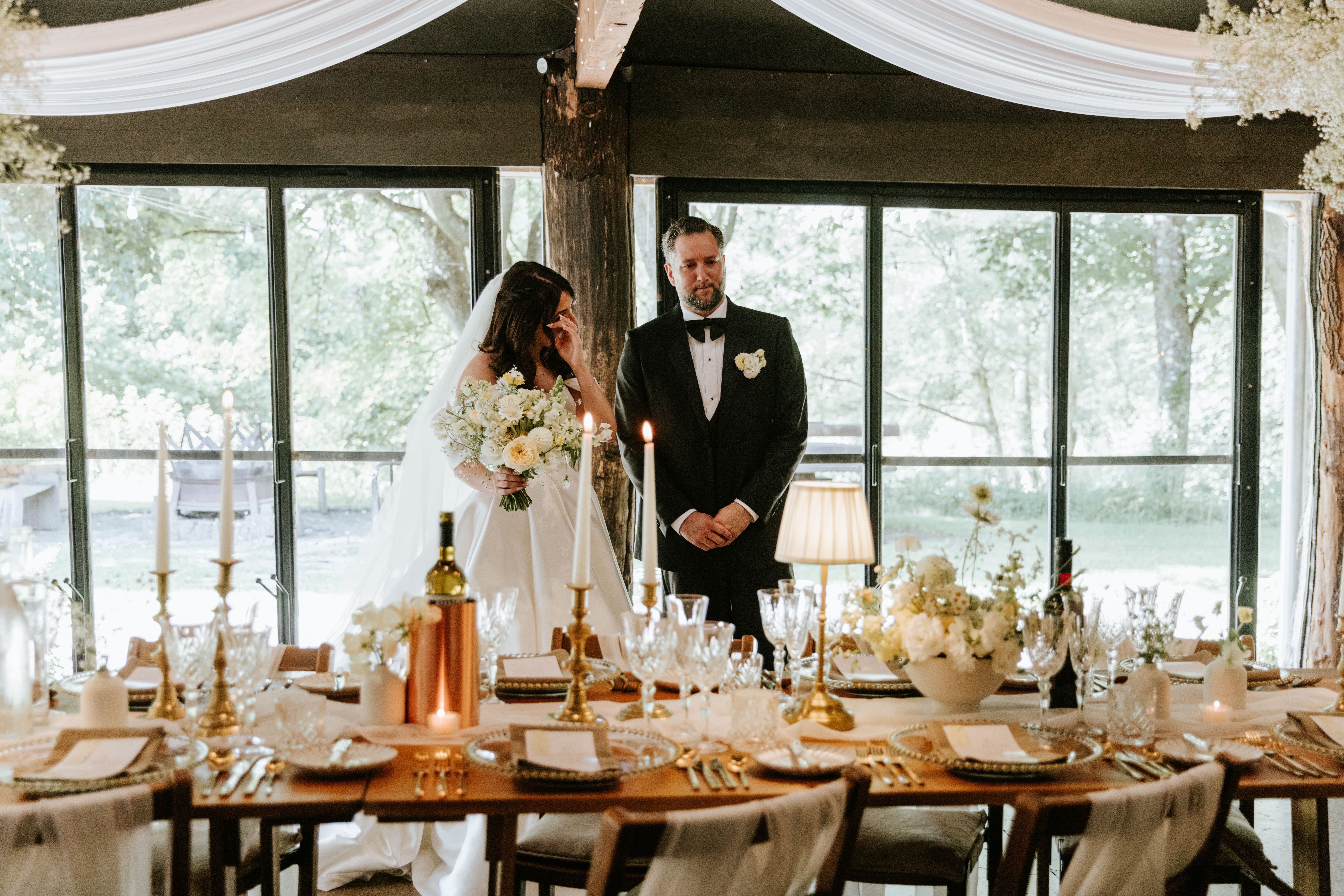 Venue Styling Room Reveal Bride and Groom look at wedding breakfast
