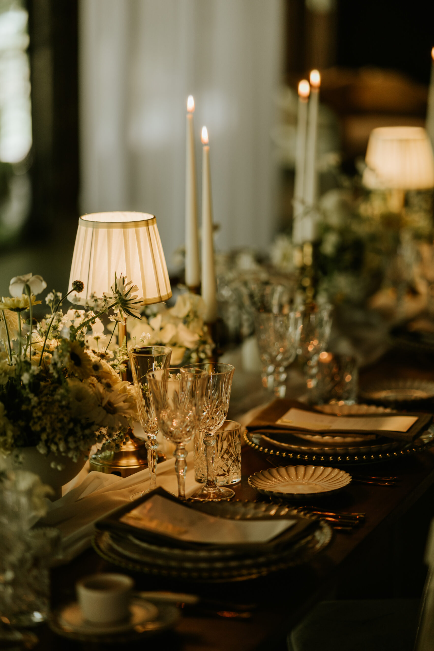 Venue styling with charger plates napkins and candlelight
